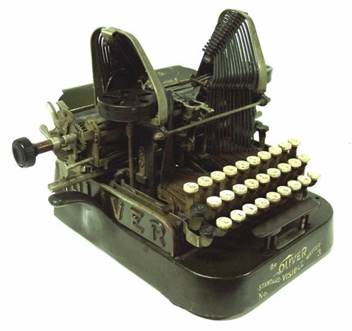 Photo of an Oliver 3 typewriter from the right front.