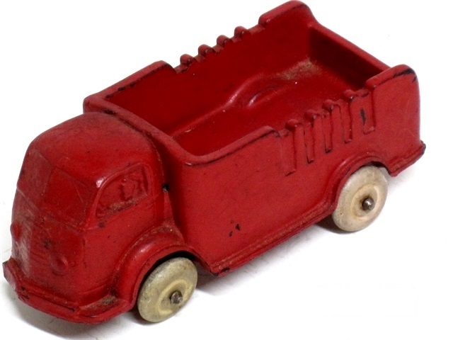 This is a photo of a red AT04 4 1/4 inch International cab-over engine (COE) truks.