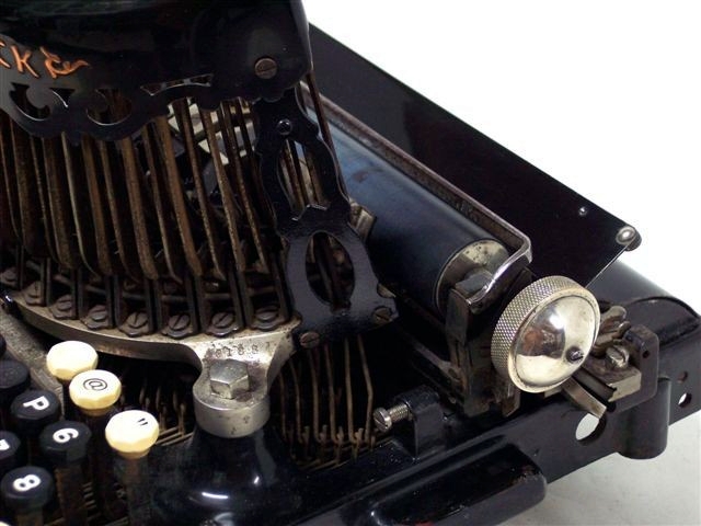 This is a close up view of the right end of the carriage and part of the typebars.