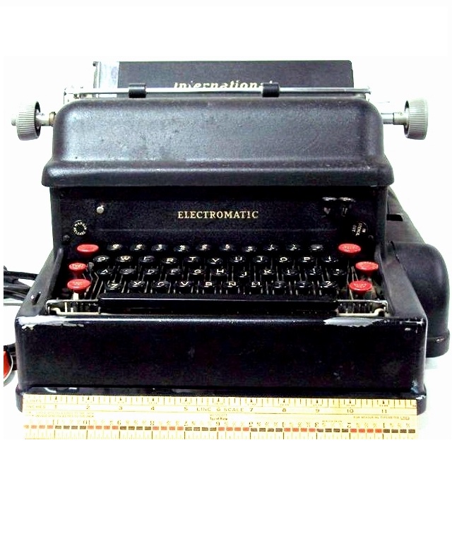 Seen directly from the front, the Electromatic looks very much like a manual typewriter but for the power cord on the left and a large bulge on the right. It is bulky and quite heavy.