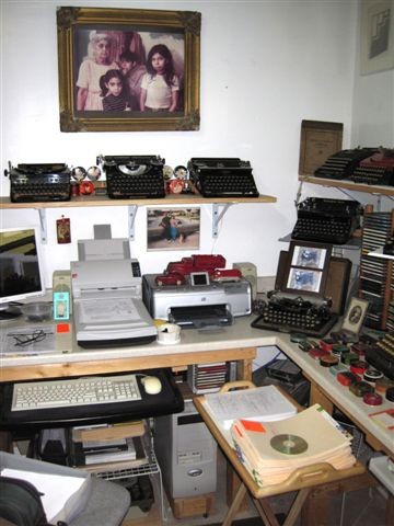 All the computer equipment and counter tops shown in this photo are gone. Today, this space is occupied by a four-shelf rolling metal display rack for the Olympia and Olivetti portables.
