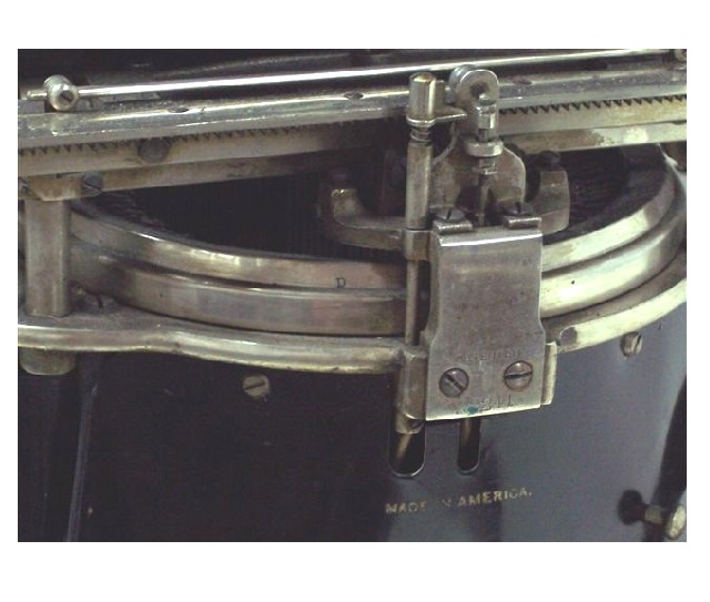 This close-up shows the carriage bracket at the back of the case as well as the Made in USA marking.